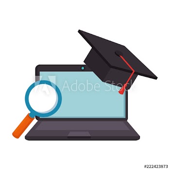 laptop with magnifying and hat graduation