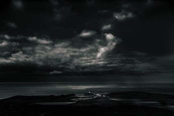 large body of water during nighttime