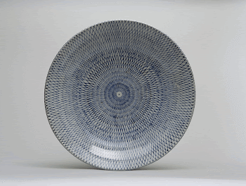 large round porcelain platter with underglaze | Free Photo - rawpixel