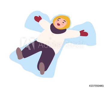 Laughing child lying on ground and making snow angel