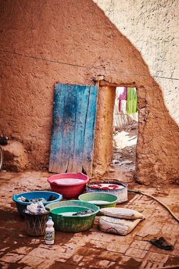 laundry in plastic basins