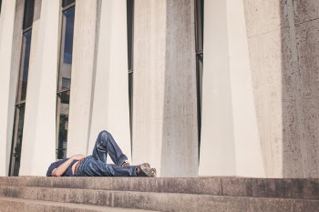 Laying Down on Pavement Free Photo 