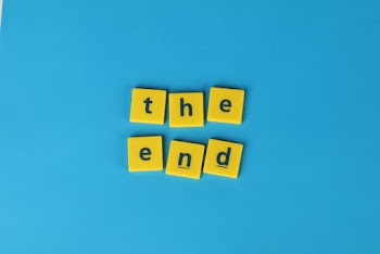 Letters On Yellow Tiles Forming "The End" Text