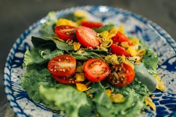Lettuce Salad Cherry Tomatoes on White and Blue Plate Close-up Photography