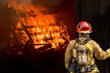 Lieutenant observing the practice fire