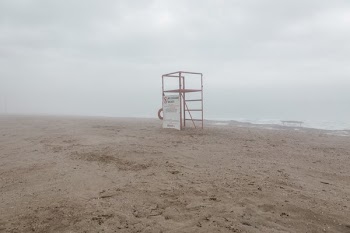 Lifeguard Stand On Foggy Beach