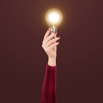 Light bulb creative business idea symbol held… | Free stock photo | High Resolution image