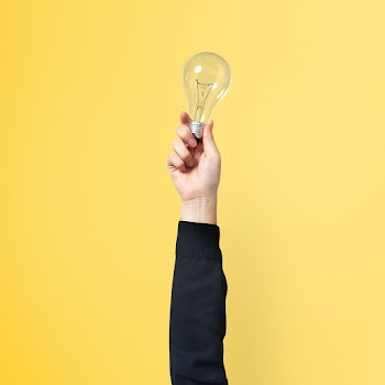 Light bulb creative business idea symbol held… | Free stock photo | High Resolution image