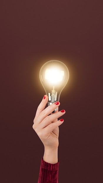 Light bulb creative business idea symbol held… | Free stock photo | High Resolution image