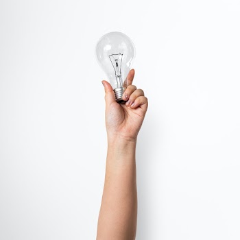 Light bulb creative business idea symbol held… | Free stock photo | High Resolution image