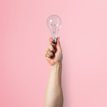 Light bulb creative business idea symbol held… | Free stock photo | High Resolution image