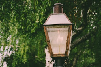 Lighted Brown Metal Post Lamp