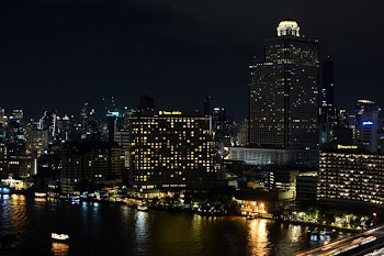 Lighted Buildings Near Body Water