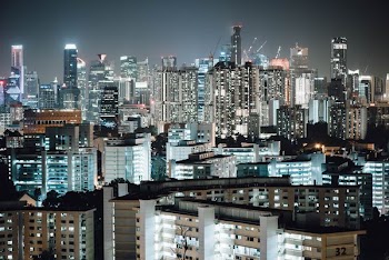 lighted city buildings during nighttime