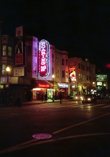 Lighted Signage On Building At Night