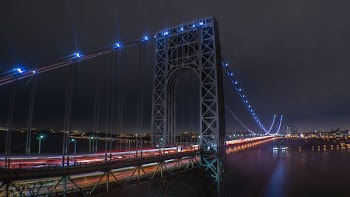 lighted suspension bridge wallpaper