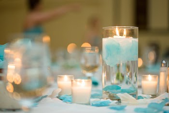 Lightened Candles in Clear Glass Cups