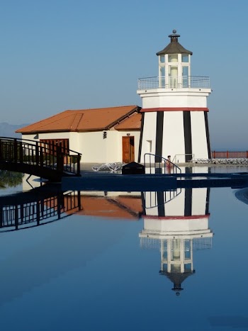 Lighthouse in Front of Swimming Pool