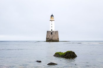 Lighthouse in middle of ocean. | Free Photo - rawpixel