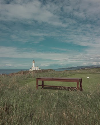 Lighthouse Near Bench
