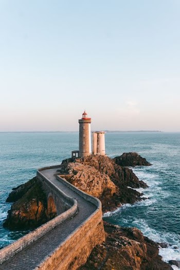 lighthouse near body of water