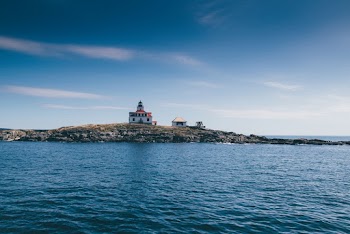 Lighthouse Near Ocean
