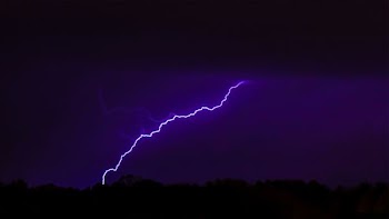 lightning striking mountain