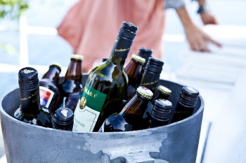 Liquor Bottles in Gray Bucket