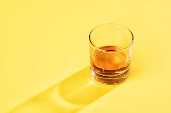 Liquor in Clear Rocks Glass
