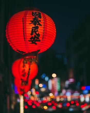 lit red Chinese lanterns during nighttime
