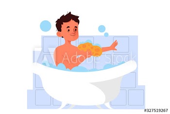 Little boy taking a bath