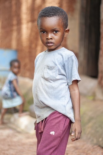 Little Boy Wearing Blue Shirt