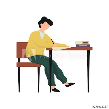 Little child sitting at the desk and doing homework