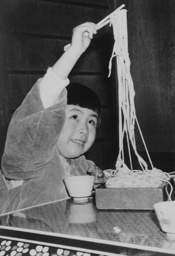 Little Girl Eating A Meal Of Noodles · Free Stock Photo