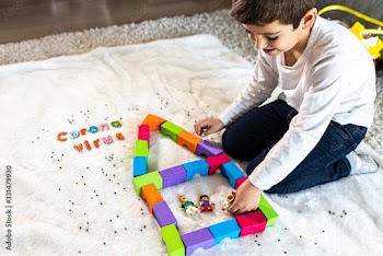 Little kid playing and understanding wath the coronavirus is