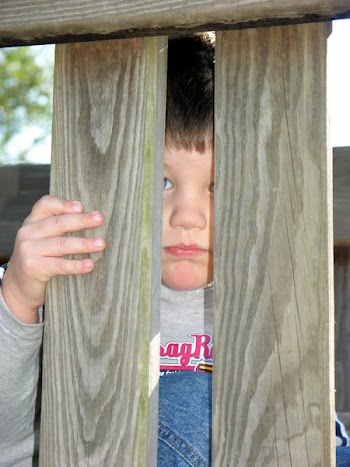 littleboyhiding.jpg
