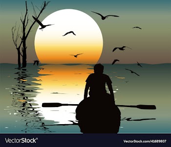lonely guy sitting in a boat at sunset