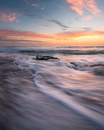 Long-Exposure Photography Of Ocean Wave During Golden Hour