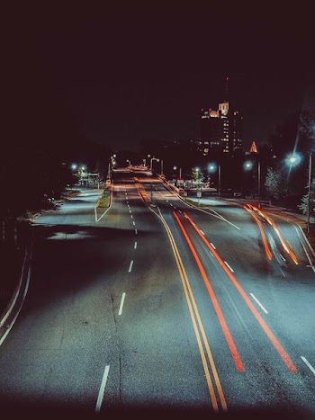 long exposure photography of road and cars