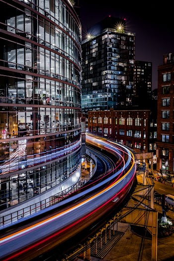 Long-Exposure Shot Of Buildings And Train