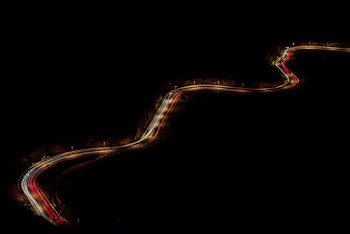 Long Road during Nighttime With Lights