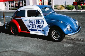 Look Sharp Barber Shop sign (painted 1969… | Free public domain photo