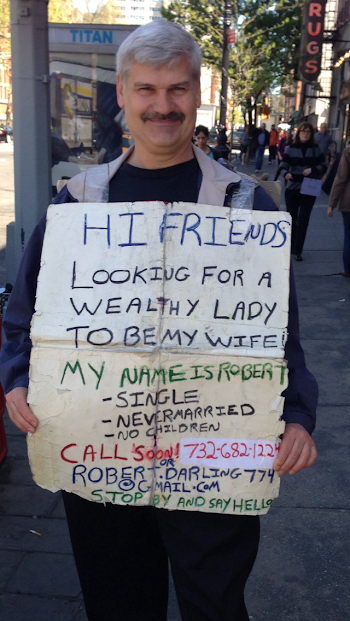 Looking For Love: Man Wears Sandwich Board To Attract A 'Wealthy ...