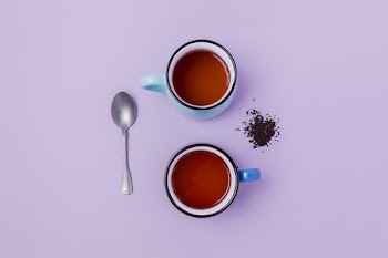 Loose Leaf Tea Brewed On Purple