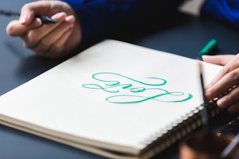 Love Written In Green Graphic Ink