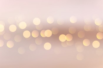 Lovely soft background with circular bokeh lights Free Vector