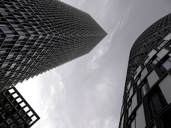 Low Angle Grayscale Photogray of High Rise Buildings
