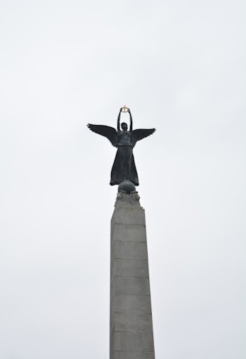 Low Angle Photo of Angel Statue