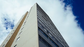 low angle photo of beige building
