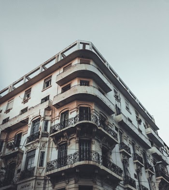 Low-angle Photo of Beige High-rise Building